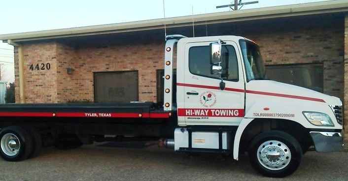 Example of a tow truck used by our towing and Gresham locksmith services.